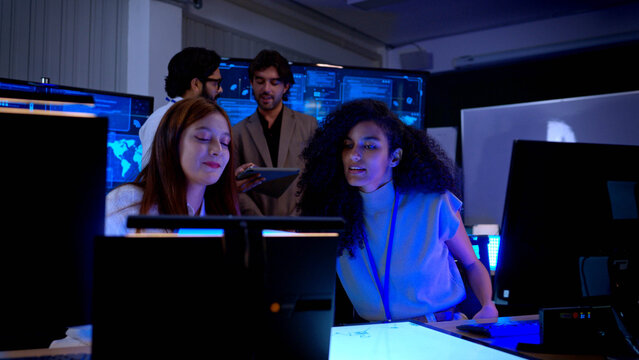 Creative female technology professionals collaborating on digital product development and software planning