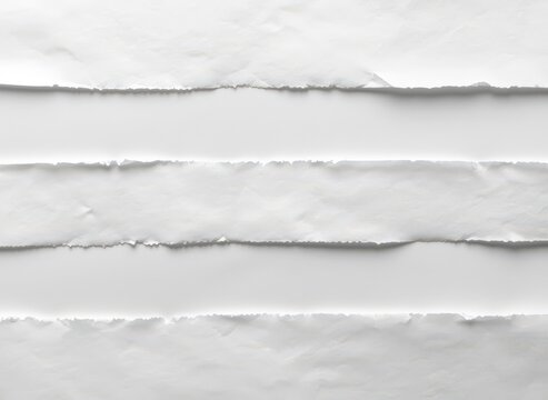 Abstract background of torn white paper strips with rough edges and soft shadows, creating a layered texture effect