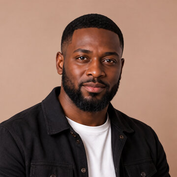 Portrait of a young dark-skinned man isolated in a light brown background with copy space, Charming handsome young man professional profile picture. studio lighting, friendly and confident expression