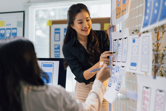 Designer presenting UX UI mobile application design.