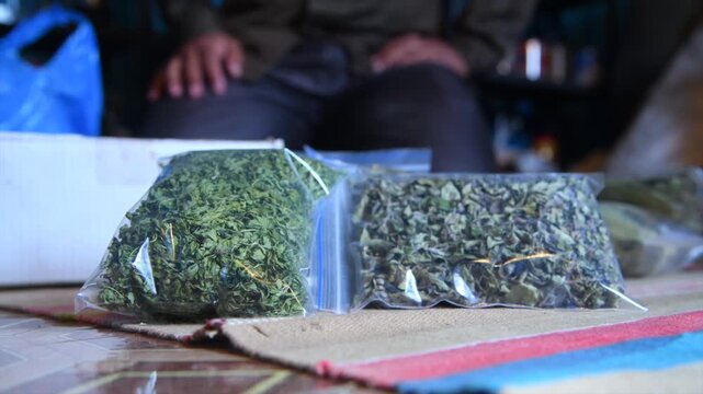 Packaged Dried Tulsi and Curry Leaves in Transparent Pouches