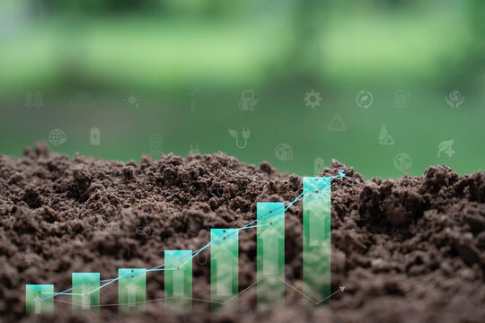 Sustainable agriculture and green economy concept featuring rich soil, rising growth charts, clean energy icons, carbon reduction, renewable technology, and environmental innovation for future busines