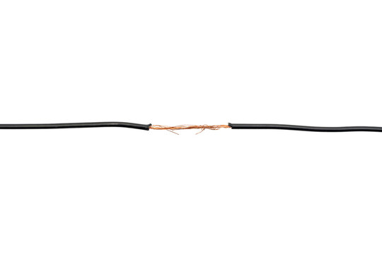Close-up of a damaged black electrical cable with exposed copper wires against on a transparent background.