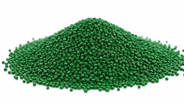 Pile of green plastic resin pellets on white background. Small synthetic granules for industrial manufacturing, polymer production. Raw material mass for plastic molding process. Raw polymer granules