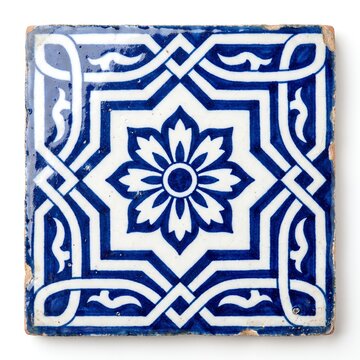 Blue and white ceramic tile with geometric pattern