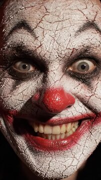A Haunting Transformation: From Crimson Shadows to a Sinister Grin, This Video Chronicles the Evolution of Terrestrial Colors into a Creepy Clown Persona