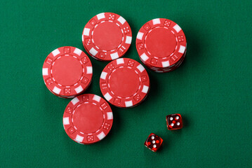 Fototapeta premium Multicolored casino chips as a conceptual backdrop for gambling games like poker, blackjack