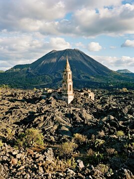 Historic Church Amidst Volcanic Landscape