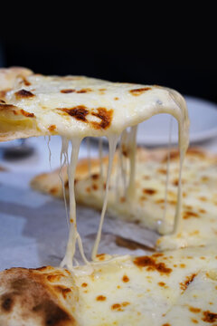 Freshly baked homemade italian gorgonzola pizza close up view