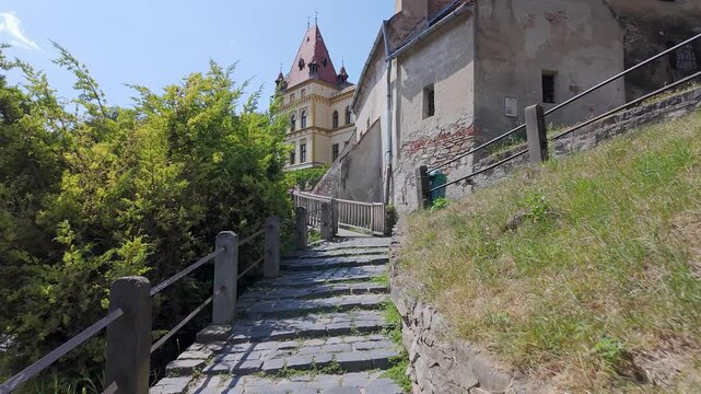 Stone steps leading through the historic Old Town of Sighisoara in Transylvania Romania