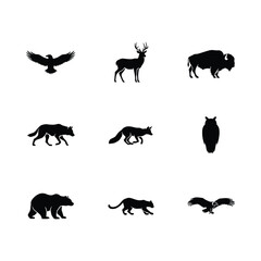 Obraz premium Collection of animal silhouettes including an eagle deer bison wolf fox owl bear panther and hawk against a white background