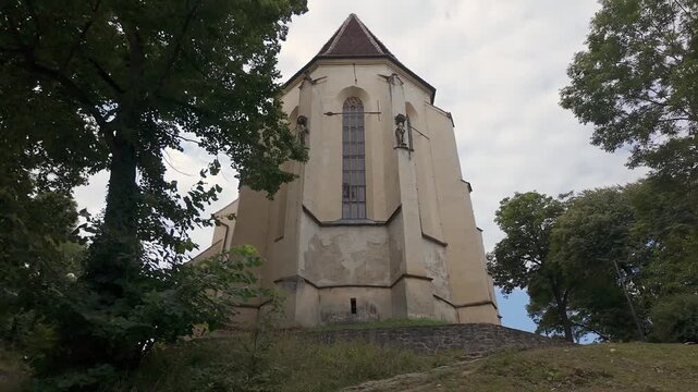 Historic Church on the Hill surrounded by trees in medieval Sighisoara Transylvania Romania