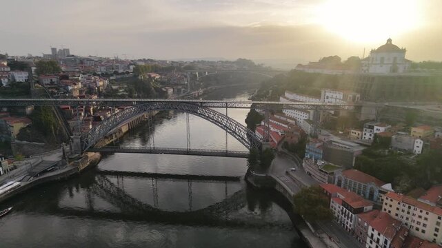 bridge over the river porto portugal drone sunrise