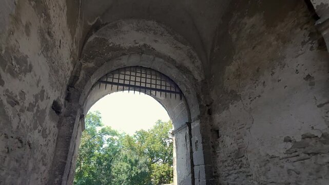 Stone arched passage beneath the medieval Tailors Tower in Sighisoara Transylvania Romania