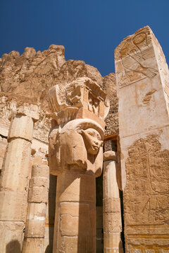 Ancient stone carving detail inside the Mortuary Temple of Hatshepsut in Luxor Egypt