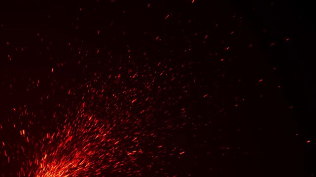 Flying Firework Ember Particles on Dark Background, Red Glowing Sparks, Bokeh Lights and Fiery VFX Animation