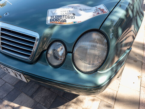 Gandia, Spain - September 19, 2026. Classic green Mercedes Benz E Class with Rally Clasico Territorio Borgia sticker in Spain