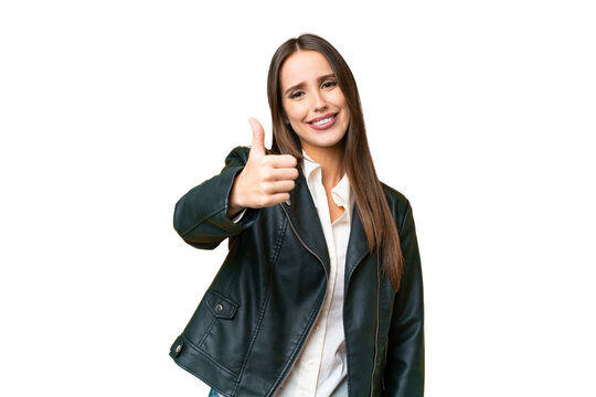 Young beautiful woman over isolated chroma key background with thumbs up because something good has happened