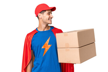 Super Hero delivery man over isolated background looking side © luismolinero