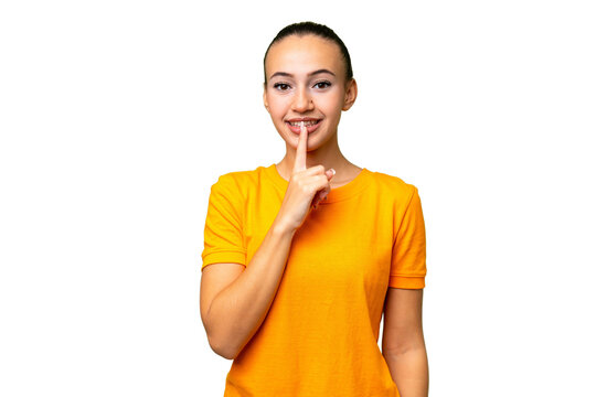 Young Arab woman over isolated background showing a sign of silence gesture putting finger in mouth