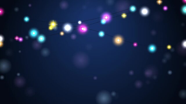Colorful holiday string lights glow softly against a deep blue background creating a festive magical