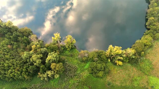 Top Down Drone Flight Over Lake with Cloud Reflections in Belgium