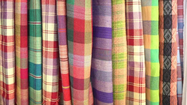 Traditional Thai Pah Khao Mah Plaid Cotton Fabric Rolls Hanging