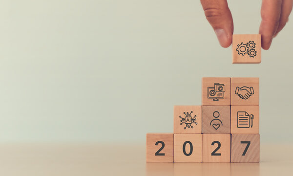 2027 Business Roadmap, AI and Digital Transformation Strategy. Wooden blocks with artificial intelligence, CRM, digital transformation, partnerships, automation, operational efficiency.