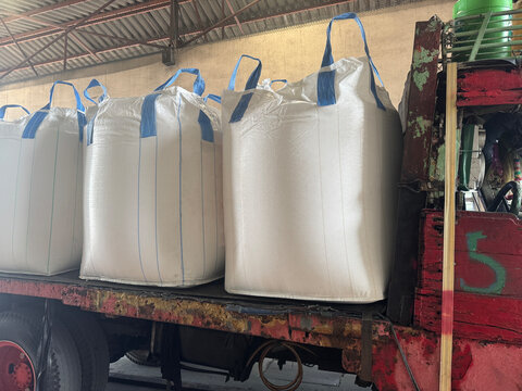 Chemical fertilizer Urea Stockpile white jumbo-bag Large ammonia nitrate in waiting for shipment is placed in the warehouse. Transport for farmers
