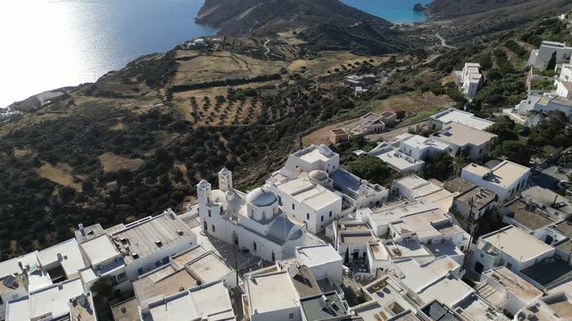 Blue Domed Church in Plaka Village on Milos Island Greece