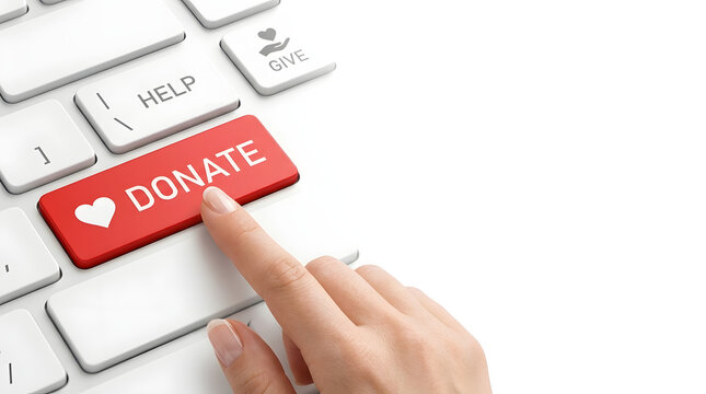 Close up of a woman's finger pressing a red donate button with a heart symbol on a white computer keyboard, conceptual image for online charity, fundraising, philanthropy and social support.