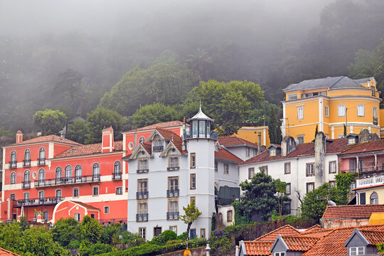 Colorful Historic Buildings of Sintra Old Town Nestled in Mountains with Fog