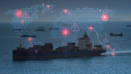 Global cargo ship navigates ocean facing maritime supply chain risk with tense digital world map showing trade disruption © Piya W.