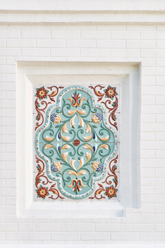 Traditional Russian Yaroslavl ceramic izrazets tile panel on white facade