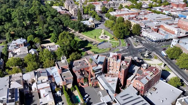 Central city square rooftops of buildings at Bendigo downtown streets historic houses.