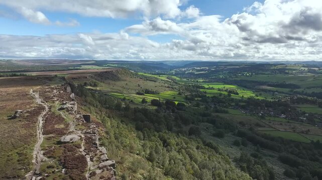 Rocks and Moorland over Curbar Edge and Hope Valley from a drone, Peak District National Park, Curbar, Calver, England, UK