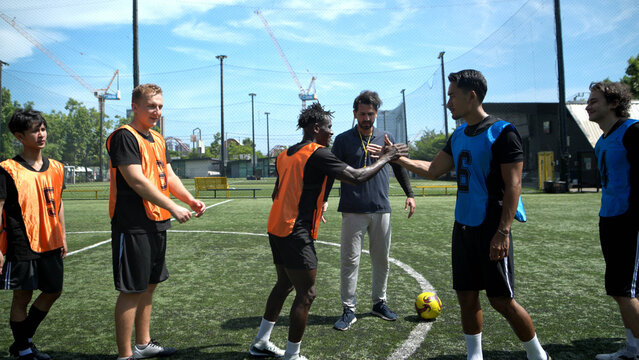 Before the match began, the referee had players from both teams shake hands to emphasize good manners,
