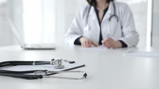 Stethoscope on clipboard, doctor working in office, preparing for patient examination, medical healthcare appointment. Medicine, healthcare and science concept