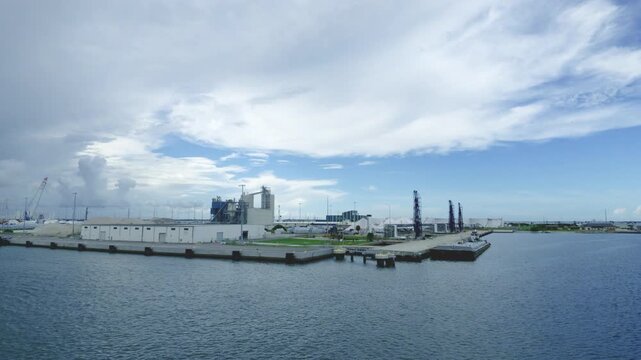 Cape Canaveral, Florida, USA - September 27, 2026: Industrial shipping docks and terminal facilities at Port Canaveral with cargo infrastructure