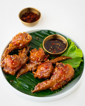 Sweet Thai chili wings, sticky and spicy, Honey Chili, Sticky Chili, Spicy Glazed, Asian Chili, Korean-Style Sweet & Spicy Wings, Thai-style sweet chili chicken wings with a glossy glaze