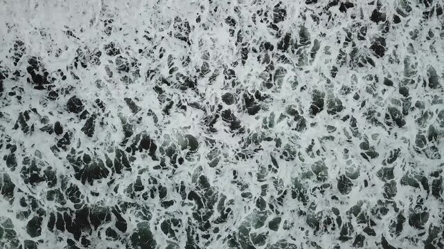 Aerial View of Ocean Waves at Batu Karas Beach Indonesia