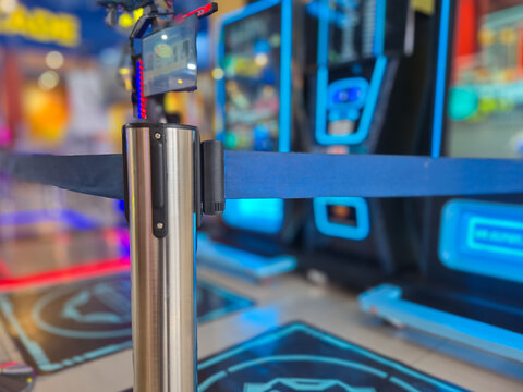 Retractable Queue Barrier Belt Stanchion Pole in Entertainment Arcade Center Indoor Venue