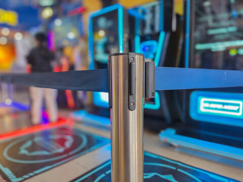 Retractable Queue Barrier Belt Stanchion Pole in Entertainment Arcade Center Indoor Venue