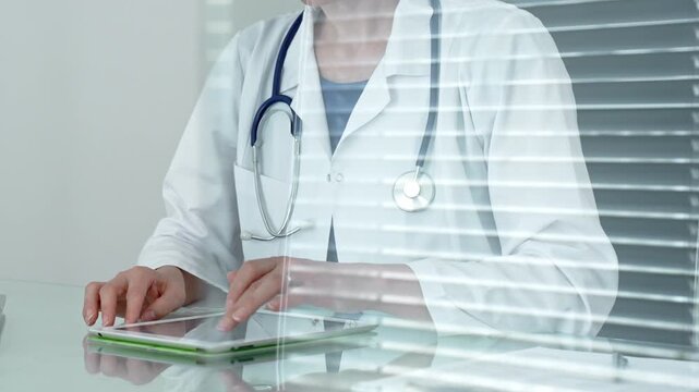 Medical professional using digital tablet, leveraging modern technology for patient care and health consultation, researching crucial information, and managing medical records