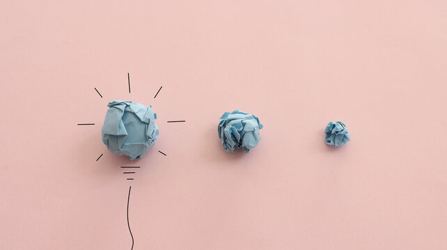Education concept image. Creative idea and innovation. Crumpled paper as light bulb metaphor