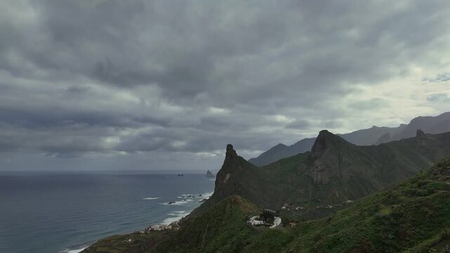 Timelapse of dark storm clouds rolling over Roque de las &Aacute;nimas, Taganana and the Atlantic coast in Anaga Rural Park, Tenerife, Canary Islands, Spain
