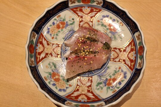 Japanese cuisine: kanpachi (greater amberjack) sashimi with aosa seaweed salt in Kyoto, Japan