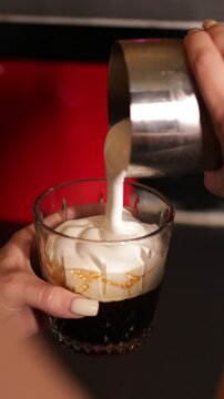 Mixing drinks at a bar with friends in a social setting