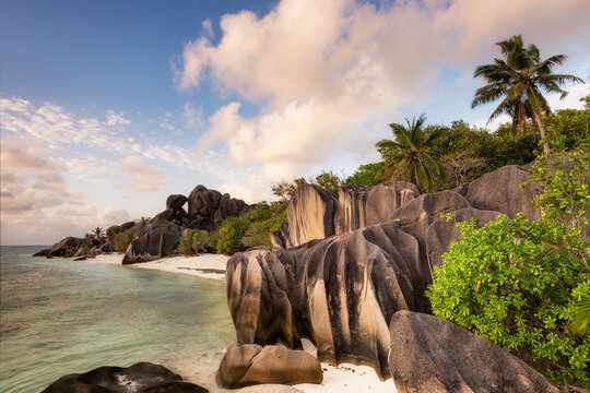 Large weathered granite boulders on a sandy beach, Anse Source d'Argent beach, La Digue Island, Seychelles