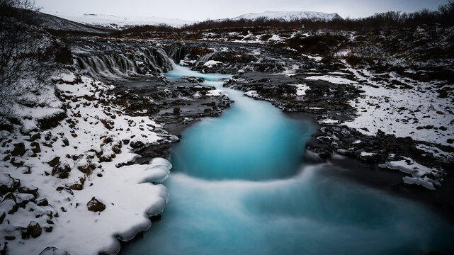 Beautiful waterfall with blue colour Br&uacute;arfoss, popular tourist landmark, Iceland